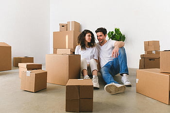 happy couple, unpacked carton boxes, new apartment, moving boxes, cheerful couple, planning future, sitting together, cardboard boxes, moving day, home relocation, couple moving in