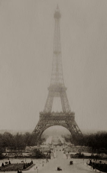 Eiffel Tower, Paris France, foggy day, old photograph, classic Parisian view, vintage photo, Paris landmark, foggy weather, historical image, French architecture, European landmarks