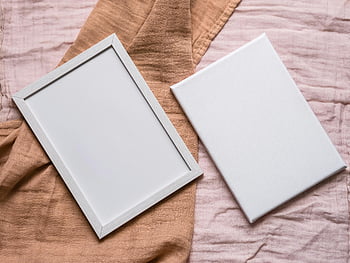 blank photo frame, minimalist flat lay, photo frame mockup, canvas mockup, beige fabric, flat lay photography, mockup template, blank canvas, photo frame design, flat lay composition, beige background