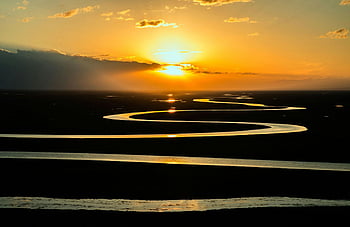 meandering river, sunset, serene beauty, vibrant sky colors, large body of water, stream, dawn, nature, landscape, golden hour, reflection