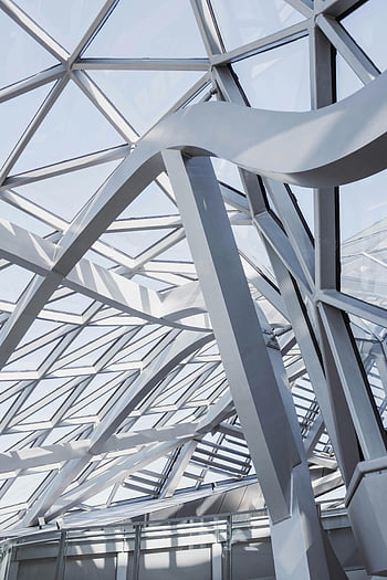 modern building interior, steel frame structure, glass panels, geometric design, glass roof, city setting, elegant capture, modern architecture, interior design, architectural details, urban design