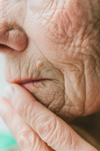 close-up, old person, wrinkles, aged skin, senior adult, face, hand, detailed, close-up shot, aged appearance, elderly features
