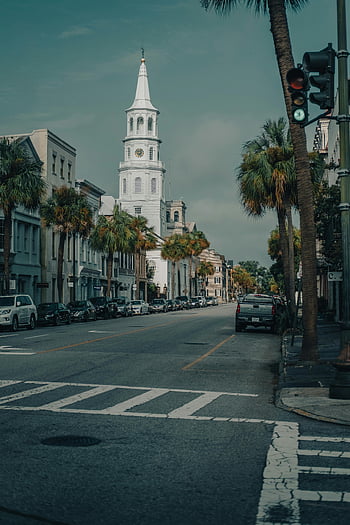 Charleston City Center, South Carolina, Saint Michael's Church, palm trees, city street, serene view, historic architecture, urban landscape, traffic lights, street scene, downtown Charleston