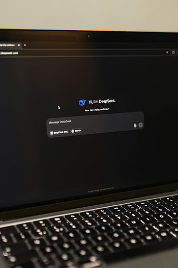 laptop, interactive AI interface, DeepSeek application, AI chatbot, computer screen, technology, user interface, digital communication, online assistance, artificial intelligence, DeepSeek