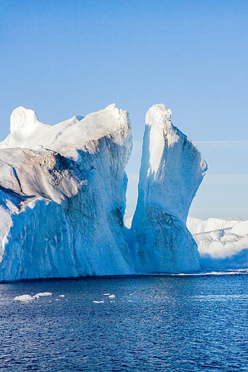 iceberg, Northeast Greenland National Park, serene waters, natural beauty, Greenland, stunning iceberg, blue ice, Arctic landscape, ice formation, cold climate, polar region