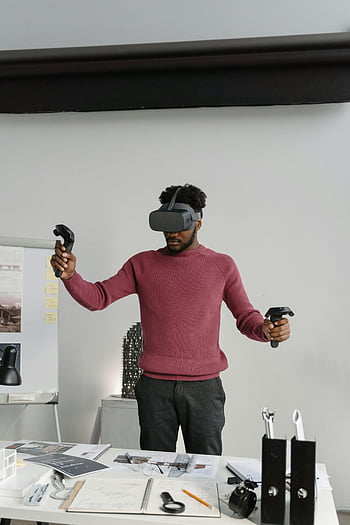 建築家、 VR技術、 オフィス設定、 設計、 可視化、 バーチャルリアリティ、 ヘッドセット、 ワークスペース、 プロジェクト開発、 クリエイティブプロセス、 近代的なオフィス