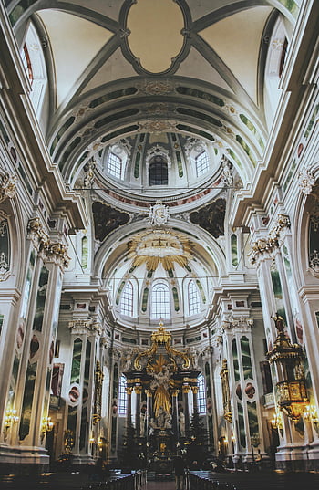 Baroque church interior, intricate details, arches, columns, sculptures, cathedral interior, gray and brown, religious architecture, ornate design, historical building, ceiling art