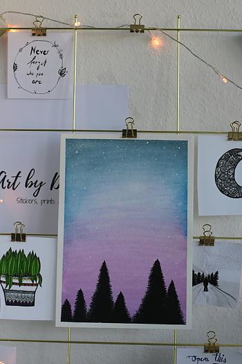 silhouette of trees painting, artistic wall display, creative paintings, string lights, cozy ambiance, wall art, home decor, night sky, tree silhouettes, string lights decor, wall hanging art