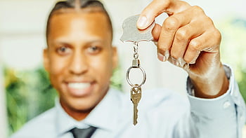 real estate agent, white dress shirt, silver key, new home purchase, cheerful, presenting key, home buyer, property ownership, key handover, real estate transaction, professional agent