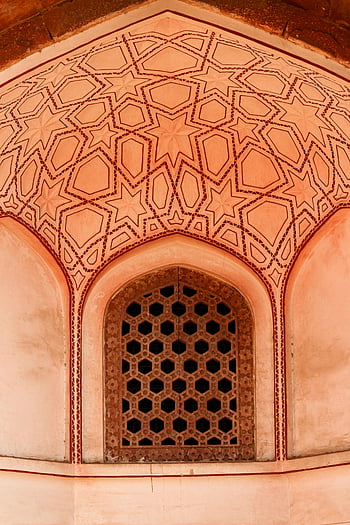 Ornate Persian Building Wall, Mughal facade, New Delhi, star patterns, geometric window design, detailed view, ornate architecture, Persian architecture, Mughal architecture, decorative wall, intricate design