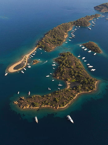 aerial photo, few islands, surrounded boats, Yassica Ada Island, anchored boats, turquoise waters, stunning aerial shot, Turkey, coastal scenery, island view, boat anchorage