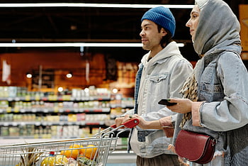 couple shopping, grocery shopping, supermarket aisle, fresh produce, shopping cart, young couple, supermarket, grocery store, shopping together, fresh vegetables, fresh fruits