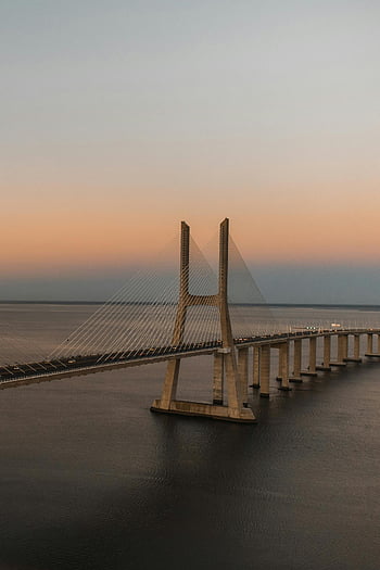 vasco da gama bridge, západ slunce, Lisabon, Portugalsko, klidné vody, dechberoucí výhled, most přes vodu, fotografování západu slunce, architektonická fotografie, cestovní fotografie, scénické krajiny