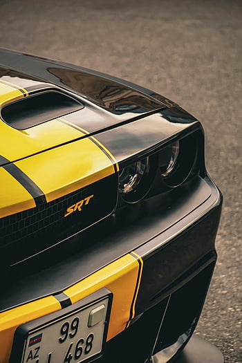 Dodge Challenger SRT, black and yellow, close-up shot, urban street, car, SRT logo, yellow stripes, front view, license plate, performance car, street parking