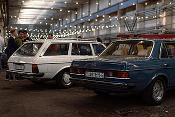vintage Mercedes-Benz, classic cars, vintage warehouse, ambient lighting, Mercedes-Benz vehicles, classic automobiles, vintage automobiles, car showcase, vintage cars, car exhibition, Mercedes-Benz classics