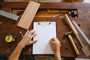 carpenter, sketching, design, paper, workshop, tools, hammer, ruler, tape measure, clipboard, pencil