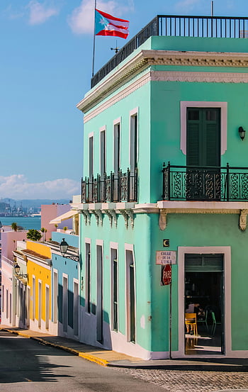 Turquoise House, San Juan, Puerto Rico, vibrant turquoise architecture, colonial architecture, blue skies, streets of San Juan, colorful buildings, Caribbean architecture