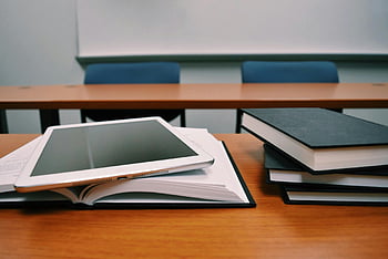 silver-ipad-white-book-page-modern-education-classroom-desk-books-and-tablet-educational-technology-study-materials-learning-tools-academic-environment-educational-resources-thumbnail.jpg
