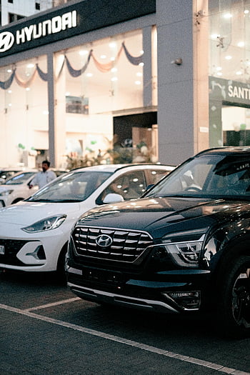 new cars, Hyundai SUVs, car dealership, Kolhapur, India, parked cars, new Hyundai, dealership exterior, automotive sales, car sales, vehicle display