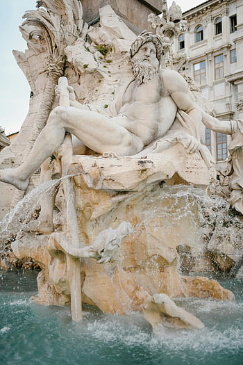 Fountain of Four Rivers, Rome, river god, intricate sculptures, flowing water, famous fountain, stunning view, Piazza Navona, Italian art, historical monument, Baroque architecture
