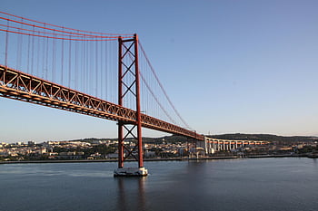 suspension bridge, Tagus River, Lisbon, Portugal, clear day, red bridge, cityscape, water, architecture, landmark, urban view