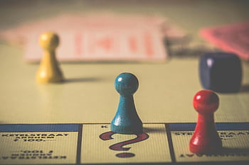 board game, vibrant tokens, dice, playing board, classic game, game pieces, colorful pawns, tabletop game, game board, game tokens, game dice