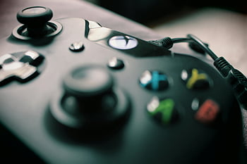Xbox One, contrôleur noir, gros plan photographie, contrôleur de jeu, design élégant, boutons colorés, Vue détaillée, contrôleur xbox, contrôleur de jeu noir, contrôleur de jeu vidéo, accessoire de jeu