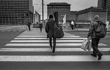 people walking, pedestrian lane, monochrome image, city street, pedestrian crossing, urban scene, black and white, street photography, daily life, commuters, crosswalk