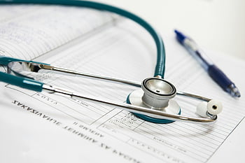 stethoscope, medical report, healthcare setting, close-up photo, pen, medical equipment, healthcare tools, medical documents, medical examination, medical records, medical device