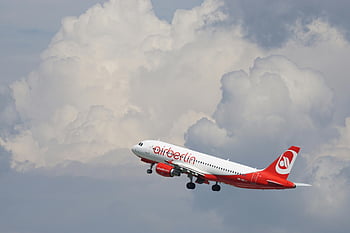 Air Berlin, red and white airplane, airplane in flight, impressive cloud background, travel themes, aviation themes, commercial aircraft, sky photography, airline branding, flight photography, air travel