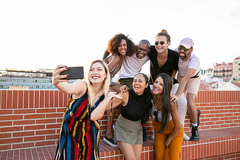 selfie, rooftop terrace, diverse friends, cheerful group, Portugal, young people, taking selfie, rooftop, diverse men and women, outdoor gathering, socializing
