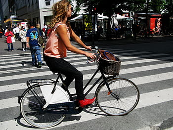 girls on bikes, Copenhagen, zebra crossing, red boots, shades, basket, chic, cycle, cycle chic press, velopassioncc, Mikael Colville-Andersen