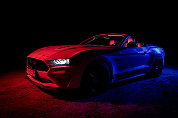 Ford Mustang, 5.0 V8, red convertible, vibrant lighting, dark background, striking car, Ford Mustang convertible, red car, car photography, automotive photography, night photography