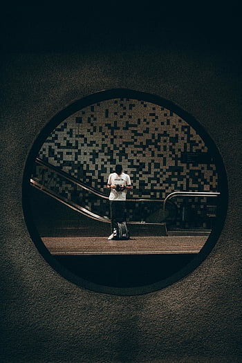 reflection, man, mirror, circular mirror, Rotterdam metro station, abstract reflection, person, metro station, urban photography, black and white, escalator