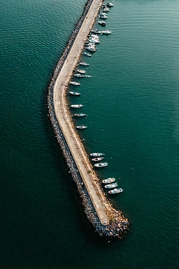 boats moored, pier, aerial photograph, calm sea, long pier, moored boats, waterfront, marina, seaside, boat dock, ocean view