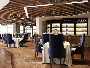 sophisticated restaurant, luxury interior, elegant chandeliers, plush seating, fine dining, white tablecloth, purple chairs, restaurant decor, dining room, upscale ambiance, dining experience