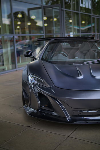 Sort McLaren, Slank sportsbil, Moderne bildesign, glasbygning, parkeret bil, sort sportsvogn, mclaren bil, bildesign, sportsbildesign, bilfotografering, McLaren Photography