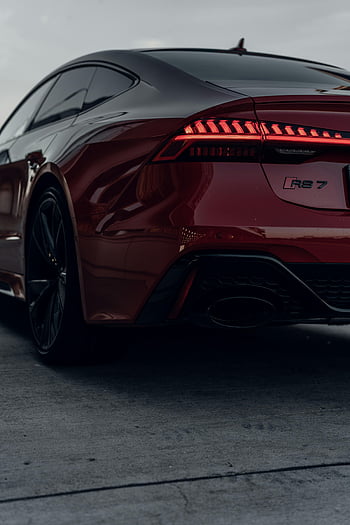 red Audi RS7, sports car, back view, sleek design, elegance, parked car, street scene, luxury vehicle, high-performance car, automotive photography, modern car design