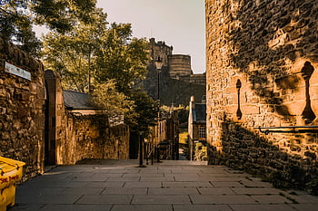 Edinburgh Castle, The Vennel, historic Scottish architecture, street in Edinburgh, Edinburgh street view, Scottish castle, historic street, Edinburgh historic buildings, castle view, Scottish landmarks, Edinburgh landmarks