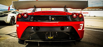 roter Rennwagen, Spoiler, Sportwagen, sonnige Rennstrecke, Dynamischer Schuss, Geschwindigkeit, Design, ferrari, Rennen, Auto, Spur