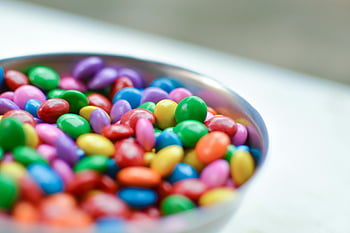 M&M's, chocolates, bowl, vibrant, close-up, assorted, candy-coated, silver bowl, colorful candies, sweet treats, confectionery