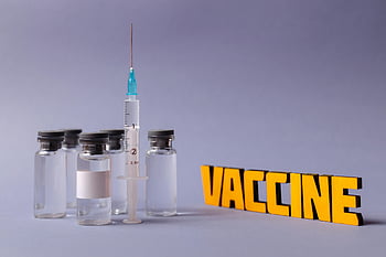 Covid19 vaccines, injection, syringe, vaccine vials, vaccine text, gray background, vaccination efforts, medical supplies, healthcare, immunization, prevention