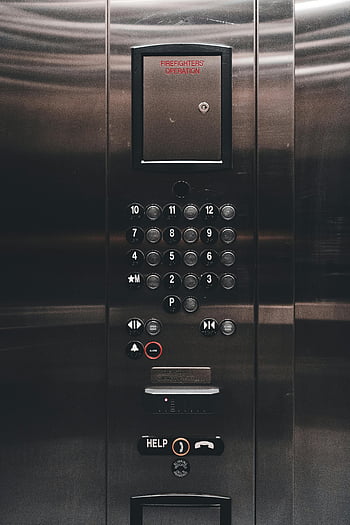 elevator control panel, metallic elevator, buttons, digital display, close-up, firefighters operation, alarm button, help button, open door, close door, elevator buttons