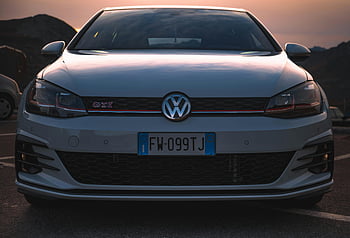 volkswagen golf gti, Vorderansicht, elegantes Design, im Freien geparkt, Sonnenuntergang, Auto, Automobil, Volkswagen, gti, Nummernschild, Italienisches Nummernschild