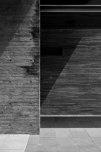 minimalist architecture, shadow play, black and white, architectural shadows, minimalist design, lines and shadows, modern architecture, abstract architecture, geometric shadows, urban photography, monochrome photography