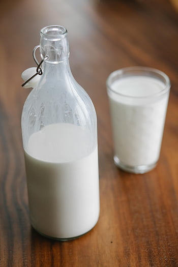 milk, bottle, glass, organic milk, wooden table, high-angle view, fresh milk, clear bottle, home, dairy, drink