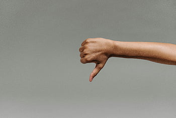 thumbs down, hand gesture, close-up, gray background, negative sign, disapproval, human hand, body language, dislike, gesture, thumbs-down