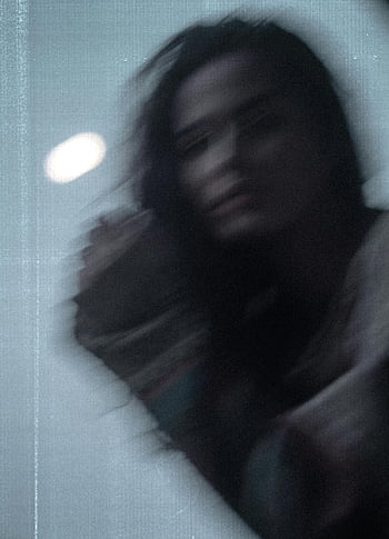blurred motion, woman, dreamlike aesthetic, abstract image, creative photography, motion blur, artistic portrait, soft focus, dynamic movement, ethereal effect, flowing hair