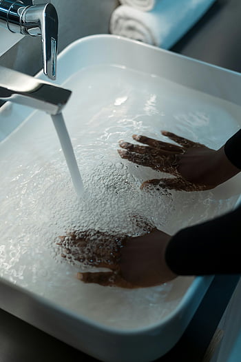 hands in sink, water, chrome faucet, modern sink, clean, refreshing, submerged hands, sink water, faucet, hands washing, refreshing water