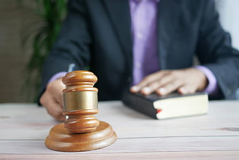 brown-gavel-wooden-gavel-legal-book-court-setting-justice-order-legal-authority-courtroom-judge-law-thumbnail.jpg